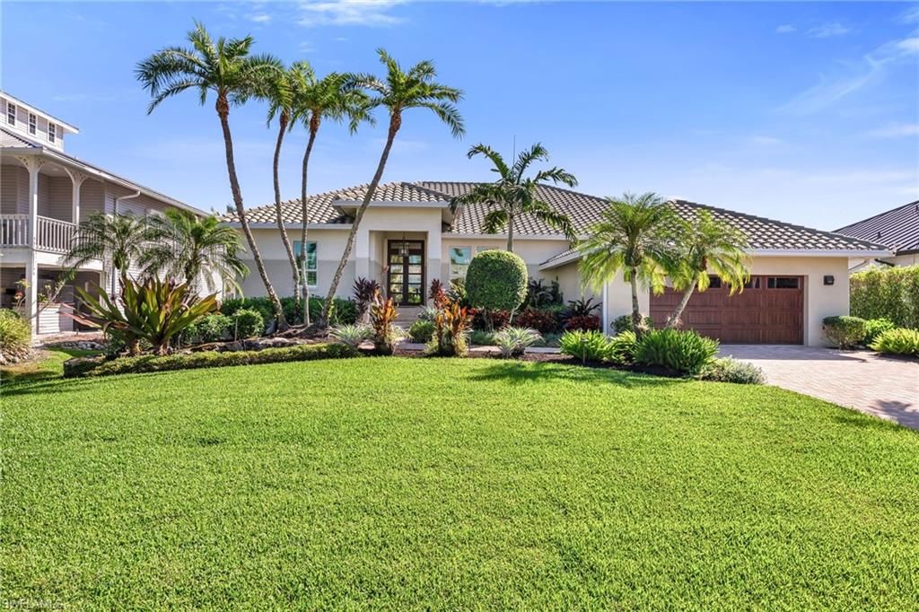 Photo of 1923 SNOOK DR, NAPLES, FL 34102 (MLS # 225076894)