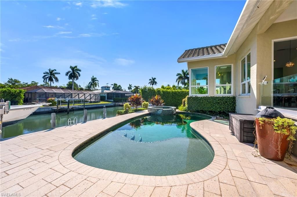 Photo of 1923 SNOOK DR, NAPLES, FL 34102 (MLS # 225076894)