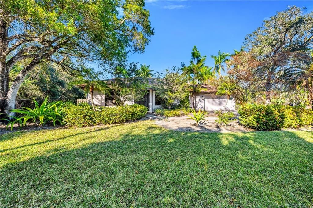 Photo of 5191 Mahogany Ridge DR, NAPLES, FL 34119 (MLS # 226004502)