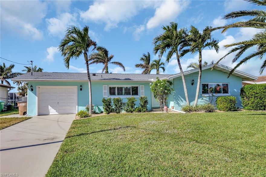 Waterfront – Boater’s Dream Home! Live the ultimate Florida lifestyle in this completely remodeled waterfront property, designed for boating enthusiasts seeking direct Gulf access and the thrill of dolphins in your backyard. This coastal-chic home is a true gem, showcasing over $300K in top-to-bottom upgrades that redefine luxury living for those who love the water. Step inside to discover a chef’s kitchen that will inspire your culinary adventures, featuring custom wood cabinetry, Level 5 quartz countertops, high-end stainless steel appliances, and a stunning 10-foot center island perfect for entertaining family and friends. The spacious master suite serves as a serene retreat, offering a large walk-in closet with organizers, dual quartz sinks, and a luxurious floor-to-ceiling tiled shower that exudes elegance. Stylish wood-plank flooring runs throughout the home, beautifully complemented by Bahama wood shutters, designer lighting, and ceiling fans that enhance the coastal ambiance. Step outside to your private boating sanctuary, featuring an oversized 80-foot composite dock equipped with a 10,000 lb boat lift, a Captain’s Walk, and a sunning deck perfect for soaking up the sun after a day on the water. Enjoy leisurely afternoons in your custom-built Tiki Hut, ideal for lounging or sipping sunset cocktails. The heated pool, recently resurfaced and retiled, invites you to relax and unwind in your own resort-style oasis after a day of boating adventures. This home is equipped with brand new A/C, impact windows, electrical, plumbing, and roof, ensuring peace of mind for years to come. Additional features include a reverse osmosis water system, security cameras, and an oversized epoxy-finished garage, perfect for storing all your boating gear. Perfectly positioned in an unbeatable location, you’ll be close to pristine beaches, dining, and shopping, with dolphins, manatees, and fish right at your doorstep. This property is vacation-rental ready and comes with a one-year home warranty for added comfort. For boating enthusiasts looking to purchase a home that offers both luxury and adventure, this is more than just a property; it’s a lifestyle. Don’t miss your chance to own this waterfront paradise—schedule your private showing today and start living your dream on the water!