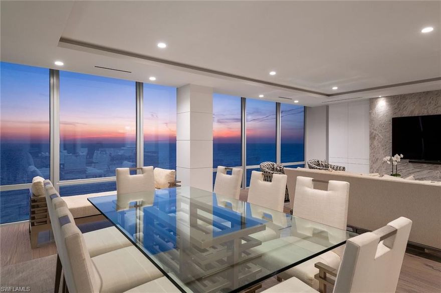 Gulf views & clean lines are the inspiration for this paradise in the sky penthouse in Le Parc. Currently being finished, the completely remodeled property boasts contemporary finishes with a coastal flair. Wide-plank white oak floors in a herringbone design welcome you as you enter through the double doors and sets the tone for custom interior finishes throughout. A dramatic TV feature wall enhances the space and ties into the thick Cristallo quartzite countertops, surrounded by sleek cabinetry and gourmet appliances. The entertainer will appreciate the open kitchen, the feature wet bar, oversized pantry & expansive outdoor terrace. The master bedroom is all about the view and offers unmatched sunsets, plentiful closet space and a spa-like bath. Encompassing a total of five bedrooms plus a study, desk niche, two guest bedroom terraces, LED lighting throughout and so much more, this is the one you have been waiting for, and it will be ready to move in for the 2021-2022 season. 24-hour security and luxury amenities for the distinguished beachfront lifestyle. Boat slips for lease or purchase are available to Park Shore residents at the Venetian Bay Yacht Club. Photo of another unit.