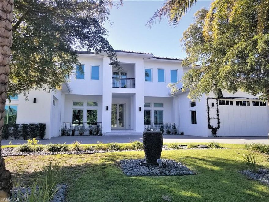 A stunning custom-built home in Coquina Sands, built in 2018 with true craftsmanship.  This home is exquisite and a showstopper.  All of the details were thought out and no detail missed.  Home features 4 bedrooms including an enormous 1st floor primary bedroom with luxury bath, 2nd first floor bedroom, office, den, large game room, balconies, 3 car garage, and superior outdoor space featuring a fireplace, outdoor kitchen, resort style heated saltwater pool/spa and pool bath.  Inside you will find in the gourmet kitchen with Wolf and Subzero appliances, waterfall quartzite countertops and walk-in pantry.  Home also features a custom elevator, Elan Home Automation system, Kohler steam & touch interface in primary bath, walk-in temperature-controlled wine room, bespoke interior fireplace as well as imported marble flooring and custom marble staircase. 0.7 miles to the beach!