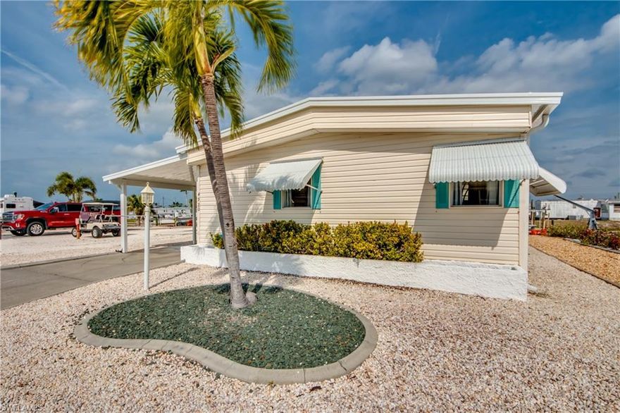 GULF ACCESS 2/2 home with direct access no bridges. This beautiful home is located in Pine Island Cove 55+ community where you own your land and the HOA is only $160.00 per month. This home has been completely remodeled with new roof, drywall thru out, new floors, new air conditioning, new cabinets with quartz counters, new bath rooms, three walk-in closets, new appliances. The master bedroom is extra large with two walk in closets. This community has a salt water pool & spa, boat ramp with GUlf ACCESS, picnic ares, dog run, fish cleaning station, bocce ball and pickleball. This home didn't have any water inside. It is located just a few minutes to some of SW Florida best fishing. Community is great place to live with lot of activities for everyone.