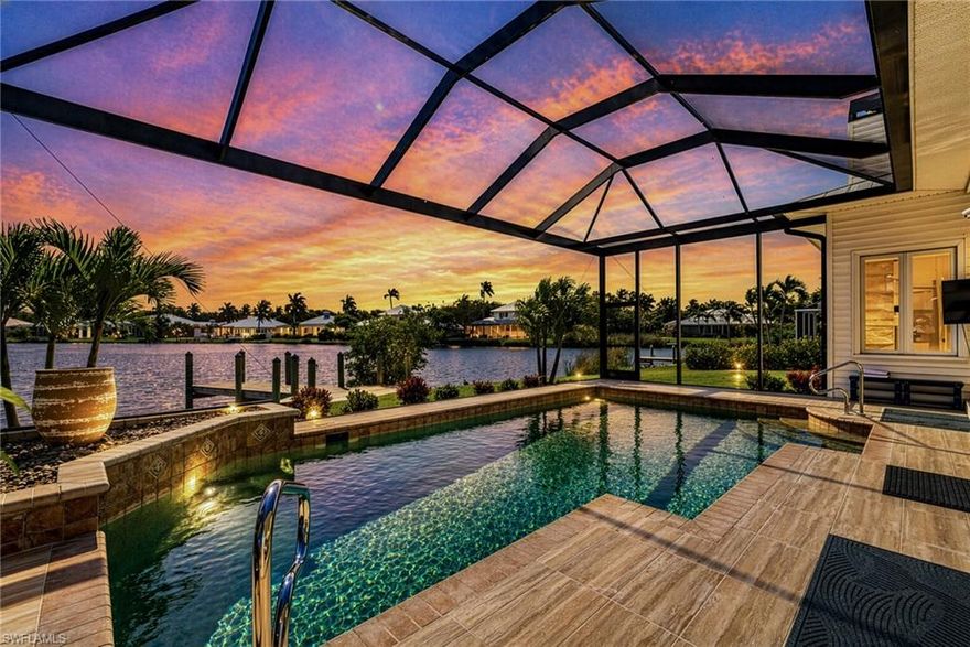 A breathtaking waterfront renewal at Coconut Creek! No expense spared in the updates on this relaxed, built for views lakefront home. A decorators touch brings this property to the utmost in luxury living. High ceilings, tall doorways and wide open rooms. This is a three bedroom, three bathroom, spacious den, plus a fitness or art room situated in perfect form. Nothing speaks further than the pictures of the views you will enjoy! The family room offers an impressive quartz tile wall fireplace that soars to the high 14' ceilings.