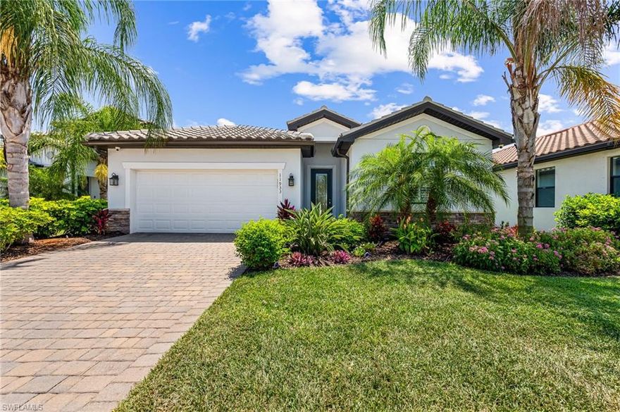 This beautiful furnished Trevi model floor plan features 4 bedrooms & 3 full baths, crown molding, high ceilings, and an open floor plan to create an inviting atmosphere for you and your family located on a peaceful cul-de-sac setting.  You'll love the luxurious chandelier lighting and large sliding door with custom-installed powered blinds.  The whole home Lutron Caseta remote-controlled lighting system works via an app and is hard-wired for security cameras. The master has two walk-in closets, dual sinks, and a large walk-in shower. The 2nd BR has its ensuite as well. The kitchen comes complete with a stainless steel appliance package, Reverse osmosis under the kitchen sink, mirrored backsplashes for a dramatic touch, and amazing pendant lights. A walk-in pantry, granite countertops, and an island make it a place you will enjoy for years. Plank tiles in the common and wet areas offer the contemporary look you desire. You will enjoy the beautiful outdoors and lake views from your extended lanai, complete with custom lighting by Lanai Lights of Fort Myers, a gorgeous accent wall, and an oversized electric lighted awning with wind sensor. Other owner upgrades include a paver driveway, a roll-up privacy screen custom wood plank ceiling on lanai, Plantation shutters, new Hot water tank, washer and dryer, a ring doorbell, and ADT Home security. You'll love the quiet and peaceful setting. Proximity to RSW Airport, spring training parks, dining, shopping, and entertainment. The town center has a resort-style pool, bar/restaurant, 24-hour complimentary coffee room, fitness center, yoga studio, card room theater, and art studio. Lighted bocceball, pickleball, and clay tennis courts will keep you active.   Plenty of room for a pool should you want to add one.  You will live every day like you're on a Florida resort vacation.