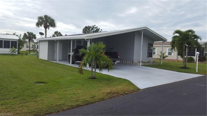This 1991 affordable dream house has all been redone so it does not have the look of paneling. Sea salt colored walls, newer AC, laminate floors 2013, brand new center isle in kitchen with matching chairs, raised panel cabinets, lanai, work shed, easy 2 car parking, lemon trees, low $150 HOA fee, 10% down financing, and more. Park boasts Jacuzzi, hospitality pool, private lake with catch and release bass fishing, private bike trails, bocci, shuffleboard, pickleball and tennis, horseshoes, newly redone exercise room, guest room for use when out of town guests come, billiards, ping pong, March Olympics, dances, parties, and trips. Very friendly residents 55-95. One owner must be 55 but the other need only be 45 or over. You can own the property if under 55 and easily rent it out. Plant your own flowers and trees in your ample yard. 15 minutes from Mrco and Naples beaches