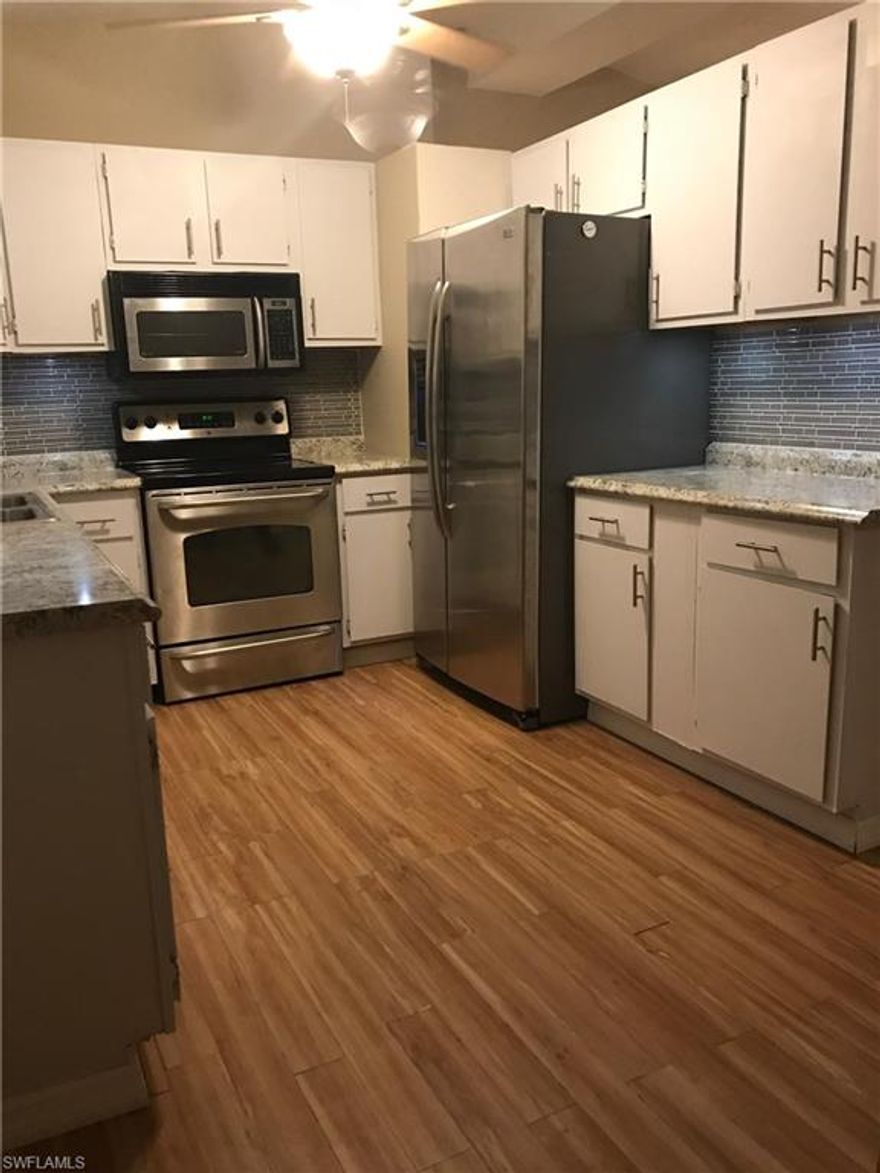 REDUCED!!This Three bedroom 1 bath home is located in San Carlos Park with city water and is priced to sell! All stainless steel appliances and glass back splash in kitchen.Offering a GREAT ROOM concept that is perfect for entertaining!Move in ready with laminate and tile throughout!Attached ONE car Garage perfect for storage or anything you desire.Back yard is fenced for privacy and pets.Close to Florida Gulf Coast University and Southwest Florida International Airport with easy access to Interstate I-75, and U.S.41. Minutes away from Southwest Florida's pristine beaches on the Gulf of Mexico.