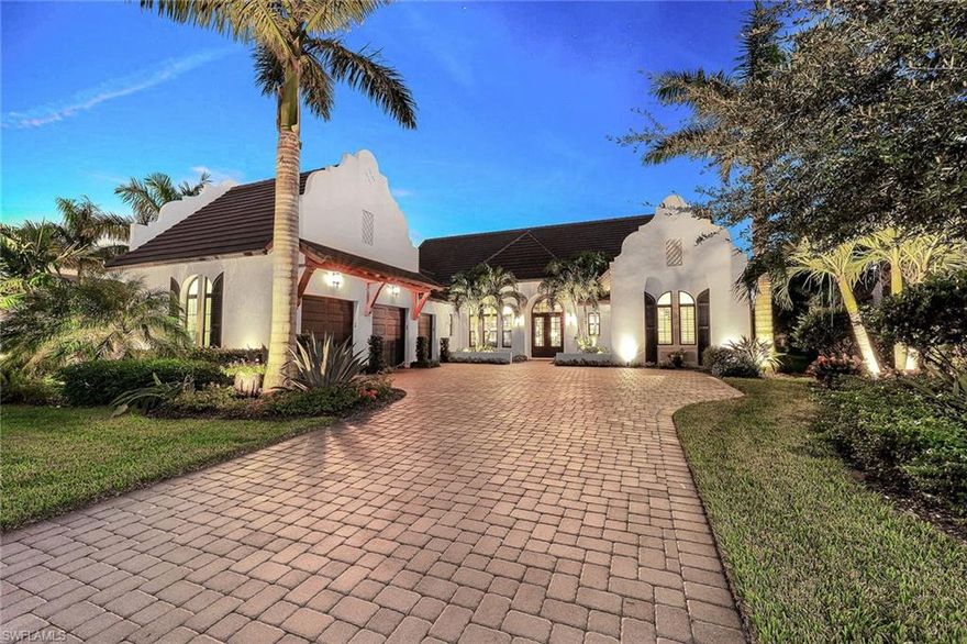 Located on an oversized extra private lot, the popular Ashton Woods Pontevedra model features 4 bedrooms plus office, 3 full baths and 2 half baths, oversized climate-controlled 3-car garage, open-concept living, vaulted ceiling with beams in the great room, wood-look tile flooring and impact glass. The kitchen features quartz counters, an island, shaker-style cabinetry and professional-grade KitchenAid stainless steel appliances with natural gas. Numerous upgrades include 2 custom wine bars, custom built-ins in the great room, outdoor fireplace, barn doors, roll-down Storm Smart shutters and custom outdoor kitchen. Master suite offers sitting area, makeup vanity space and bath with dual sinks, dual water closets, standalone soaking tub and shower with frameless glass door and a custom California closet. The home features an expansive outdoor custom pool and spa with fire bowls, picture-frame screen enclosure and 2 covered areas. Located in the award-winning community of Fiddler's Creek with access to recreational and social activities, including tennis, fitness, resort-style pools, spa services, fine dining, a poolside bar and grill and multiple clubs. Sold furnished.