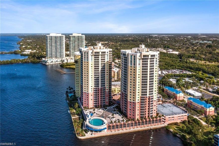 Experience elevated living in this stunning 26th-floor riverfront condo, showcasing breathtaking views of the Caloosahatchee River and the vibrant Fort Myers skyline. Ideally located in the highly sought-after Downtown District, you’ll enjoy walkable access to premier dining, shopping, and entertainment—offering the perfect blend of luxury and convenience. This beautifully updated 3-bedroom, 2-bath residence features fresh interior paint and brand-new carpet in the bedrooms, creating a clean, modern, and move-in-ready feel. The open-concept layout seamlessly connects the living, dining, and kitchen areas, all filled with natural light and framed by spectacular water views. The gourmet kitchen is designed to impress, complete with granite countertops, stainless steel appliances, and ample space for cooking and entertaining. A private elevator opens directly into your unit, providing both exclusivity and ease. The spacious primary suite is a true retreat, offering direct lanai access, stunning river views, dual walk-in closets, and a luxurious en-suite bath with a soaking tub, walk-in shower, and dual vanities. Step out onto the expansive screened lanai to enjoy peaceful river breezes, vibrant sunsets, and even seasonal fireworks—perfect for relaxing or entertaining guests. Additional highlights include two assigned parking spaces and access to an exceptional suite of resort-style amenities, including a heated infinity-edge pool and spa overlooking the river, tennis and pickleball courts, a state-of-the-art fitness center, theater, library, elegant social and party room, secure bike and kayak storage with launch access, and air-conditioned storage units. Don’t miss this rare opportunity to own a luxurious riverfront residence with unmatched views, upscale finishes, and  amenities.