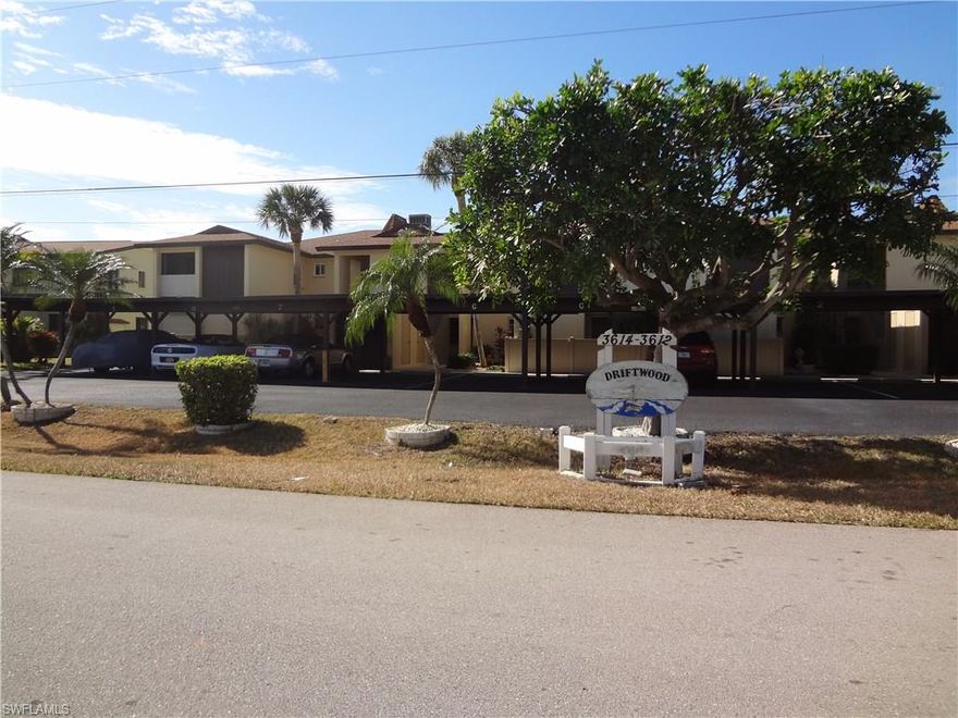 REDUCED! GULF ACCESS condo on the WIDE RUBICON canal!! One owner! Spacious 2 bedroom, 2 bath END UNIT, has fantastic BIG VIEWS and great breezes! Well maintained complex has HEATED POOL, COVERED PARKING (one 'assigned' and also an allotted 'guest' space for this unit, per seller), OUTSIDE STORAGE CLOSETS and BOAT DOCKS! GREAT LOCATION, convenient to shopping, restaurants, banks, churches, parks, & more! Since this is an 'end' unit, it has extra windows and a separate 'office' area off the guest bedroom with acrylic sliders! Eat-in kitchen plus formal dining! Good sized bedrooms! Sliders from living room & master bedroom to good sized screened lanai! Lanai also has another set of sliding glass doors along the screens, so you can enclose the lanai and keep the weather out, if desired! 'Newer' items in recent years per seller; carport roofs, refrigerator, disposal, a/c in & out, washer & dryer, water heater, & extra sliders on lanai to enclose it & keep 'weather' out! This unit has LOTS of closet/storage space inside, including a big walk-in closet in the master bedroom! Both bathrooms have heat lamps. Inside laundry room with cabinets! Unit is dated & awaiting your personal touches.