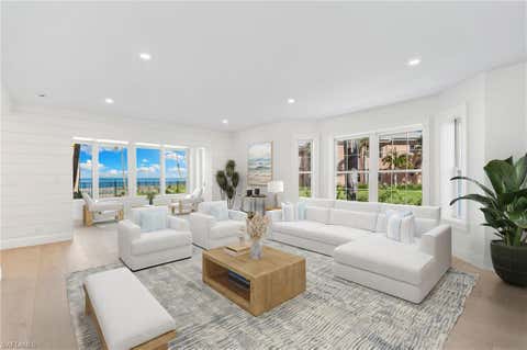 Photo of 2401 Gulf Shore BLVD N #Villa 1, NAPLES, FL 34103 (MLS # 224098516)