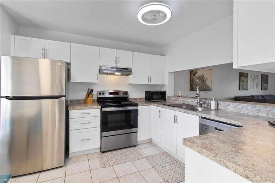 Grab a drink of your choice, head to the lanai and watch the golfers play the 15th hole! Come and enjoy what Amberly Village/Royal Wood has to offer! Royal Wood has one of the best bundled golf communities in Naples.  No waiting list for your golf membership.  Get ready to enjoy resort-like living in this partially furnished 2 bedroom, 2 bath condo.   This unit is smoke and pet free. New AC in 2022. A radon unit has been installed. Bathrooms are updated. New kitchen cabinets, newer washer/dryer. One covered parking spot-#83. Do you want to play tennis or pickleball? The court is just steps out your front door! Like to BBQ? There is a BBQ area across the parking lot. Enjoy the pool/ spa or play Bocce Ball. Amberly has a community room with a kitchen that can be used for watching sports/holding parties, or playing cards. Of course, there is also golf! No waiting list here. The newly built Pro Shop has all the gear you need and a Golf Pro on staff to help you with your game. You will also have access to the Fitness center/Yoga studio that has all the latest exercise equipment. The updated clubhouse/restaurant/bar offers a variety of social events for you to choose from. The restaurant features weekly dining specials, special events like Valentine Day's dinner, Kentucky Derby parade and dinner, Trivia night, Bingo, and so much more. Conveniently located minutes from downtown Naples, Botanical Garden, Naples Pier, Naples Pickleball courts, NCH and Physicians Hospital, Marco Island and I-75. Call today for your own private showing!