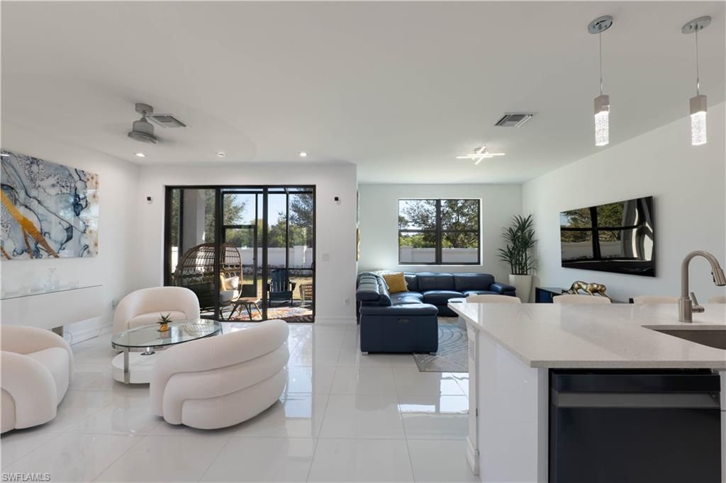 Photo of 7510 Rockefeller DR, NAPLES, FL 34119 (MLS # 226010435)