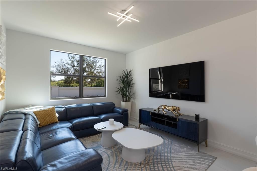 Photo of 7510 Rockefeller DR, NAPLES, FL 34119 (MLS # 226010435)