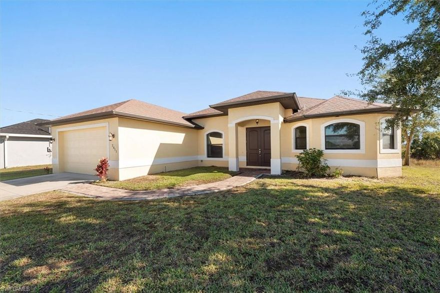 Welcome to this custom-built, better-than-new freshwater canal home located in desirable Northwest Cape Coral, where quality craftsmanship and attention to detail shine throughout.

From the moment you enter, you’ll be impressed by the stunning ceiling heights, elegant tray ceilings, and detail at every turn. This thoughtfully designed home offers 3 bedrooms plus a den and 2 bathrooms, providing flexible space for a home office, guest room, or additional living area.

The interior features tile flooring throughout, custom cabinetry, granite countertops, and newer stainless steel appliances, blending style with everyday functionality. The open-concept layout is perfect for both entertaining and comfortable daily living.

From the triple sliders in the living room, you can step outside to an oversized screened lanai that spans the full width of the home, offering peaceful freshwater canal views with a seawall already in place—ideal for relaxing, enjoying sunsets, or planning future outdoor enhancements.

Meticulously maintained and move-in ready, this home reflects pride of ownership inside and out. Located in a quiet, growing area of Northwest Cape Coral with easy access to shopping, dining, and everyday conveniences, this property offers exceptional value and timeless design.

A true standout—schedule your private showing and experience this impressive home for yourself.