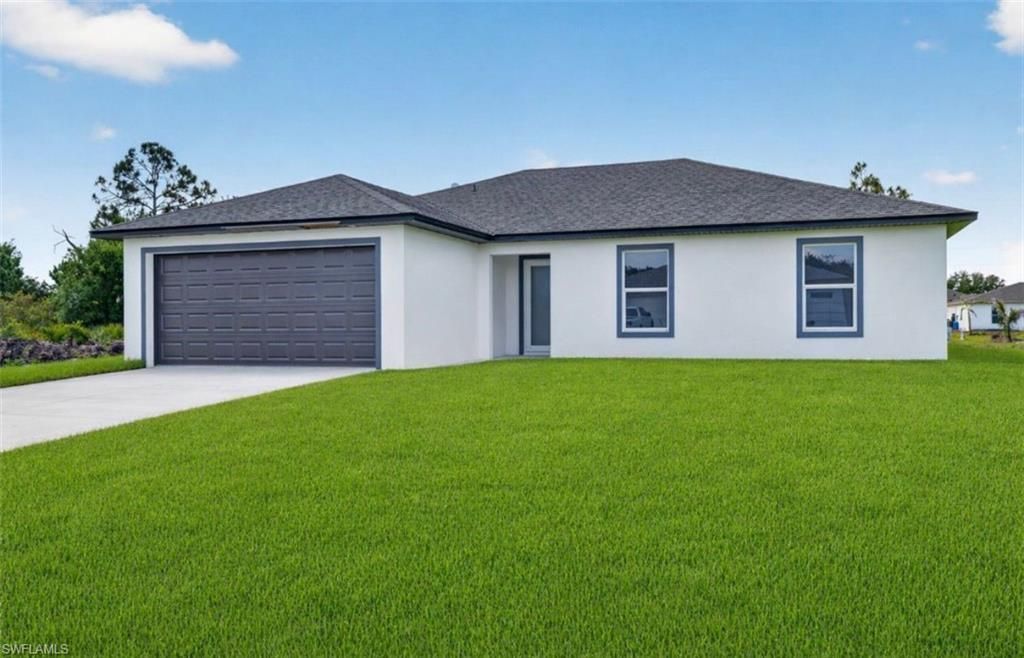 Photo of 704 Carbon ST E, LEHIGH ACRES, FL 33974 (MLS # 226016361)