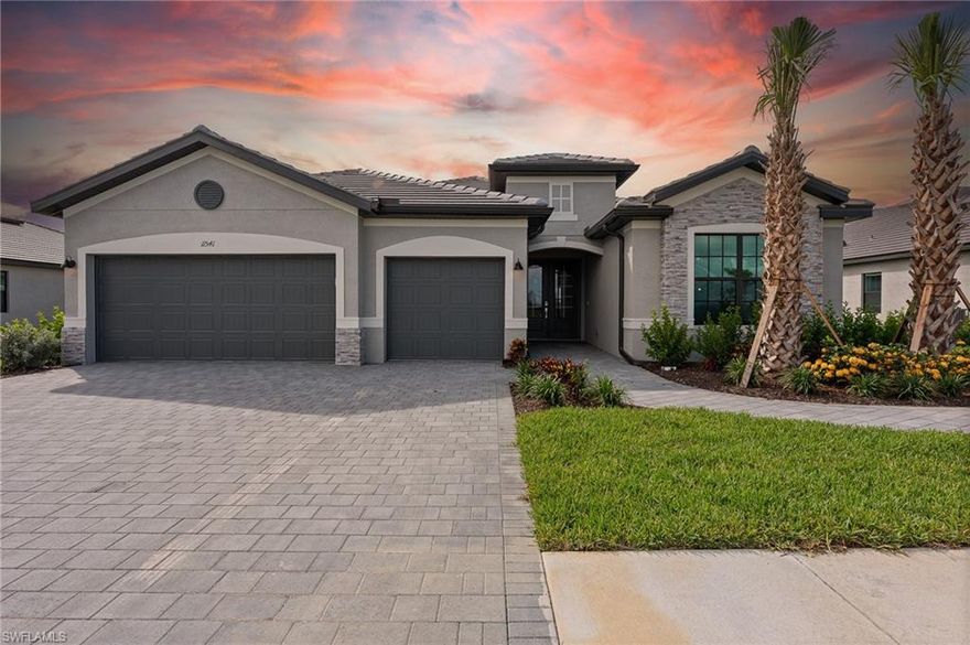 Welcome to this former fully furnished model home, professionally designed and furnished by Laura Youmans with elegant Southwest Florida-inspired finishes, showcasing the highly sought-after Summerville II floor plan. Perfectly positioned on a serene lakefront lot within the gated community of Timber Creek, this thoughtfully designed single-story residence offers 3 bedrooms plus a versatile den, 3 full bathrooms, and a generous three-car garage. The home is further enhanced with impact glass windows and doors, providing both peace of mind and energy efficiency.

From the moment you step inside, you’re greeted by an airy den just off the foyer—perfect for a home office, media room, or flex space to suit your lifestyle. The home then opens into a bright and expansive living area, seamlessly connecting the kitchen, dining, and great room. Sliding glass doors lead to your private outdoor oasis, featuring a stunning pool and spa overlooking tranquil lake views—ideal for entertaining guests or unwinding while enjoying Southwest Florida sunsets.

The luxurious owner’s suite provides a serene retreat, complete with a well-appointed en-suite bath and ample closet space. A private secondary suite offers comfort and convenience for guests, while an additional bedroom ensures plenty of room for family or visitors.

Completing the home is a spacious three-car garage, providing abundant storage and flexibility for vehicles, hobbies, or recreational equipment.

Residents of Timber Creek enjoy an unmatched lifestyle with resort-style amenities including a spectacular clubhouse with on-site restaurant, indoor and outdoor bars, a resort-style pool, splash park, fitness center, indoor gymnasium, indoor and outdoor basketball courts, tennis courts, pickleball, volleyball, shuffleboard, bocce ball courts, putting green, playground, and sports courts—all within a beautifully maintained, gated community.

Blending model-quality finishes with a functional, open-concept design, and enhanced by breathtaking water views, impact-resistant construction, and world-class amenities, this home is the perfect combination of luxury, comfort, and the ultimate Florida lifestyle.