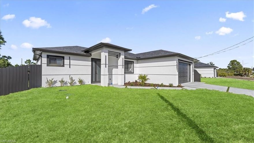 Welcome to your dream home in Lehigh Acres! This stunning single-family home boasts 3 bedrooms, 2 bathrooms, and a spacious 2-car garage. The modern office space is perfect for those who work from home or need a quiet place to study. The kitchen features beautiful granite counters and top-of-the-line stainless steel appliances, making meal prep a breeze. The sleek tile flooring throughout the home adds a touch of elegance and is easy to clean. Feel safe and secure with the included camera system, giving you peace of mind whether you're at home or away. The auto sprinkler system makes maintaining the lush landscaping a breeze, so you can spend more time enjoying your outdoor space. This home is perfect for families, professionals, or anyone looking for a stylish and comfortable living space. Don't miss out on the opportunity to make this house your home sweet home. Schedule a showing today and start envisioning your life in this beautiful Lehigh Acres property.