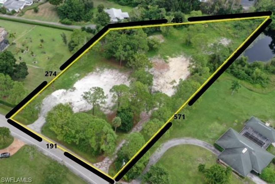 This 2.17 acres property is one of  the largest Pine Ridge homesites on the market. This community of multi million dollar homes offers privacy and seclusion while only minutes from the beautiful Gulf Beaches. You are only a short drive from upscale shopping, fine dining, Waterside Shops and Mercato.