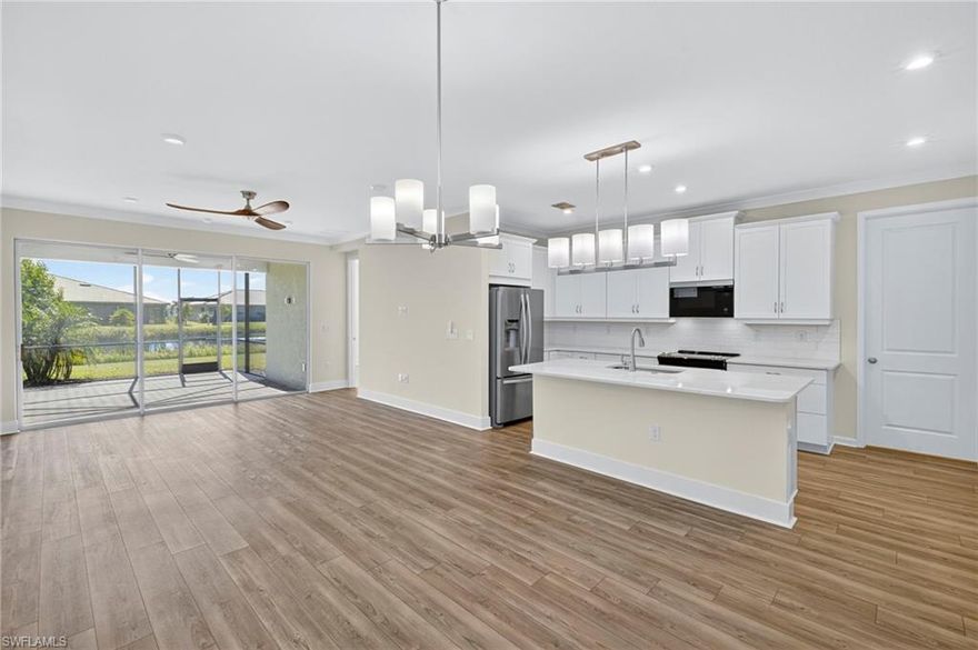 ANNUAL RENTAL AVAILABLE FEB 1ST! Newer villa with all of the upgrades! Luxury vinyl through out with tiled baths and showers. 2 bedrooms ,2 bathrooms plus a den/office, gourmet kitchen with island, designer lighting and fans, 2 CAR GARAGE, large cover Lani with extended screen with eastern exposure overlooking lake. Community pool, fire pit, cabana and exercise room. Lawn care included! Bonavie Cove a Gated Community in Fort Myers conveniently located off Plantation between Colonial and Daniels.