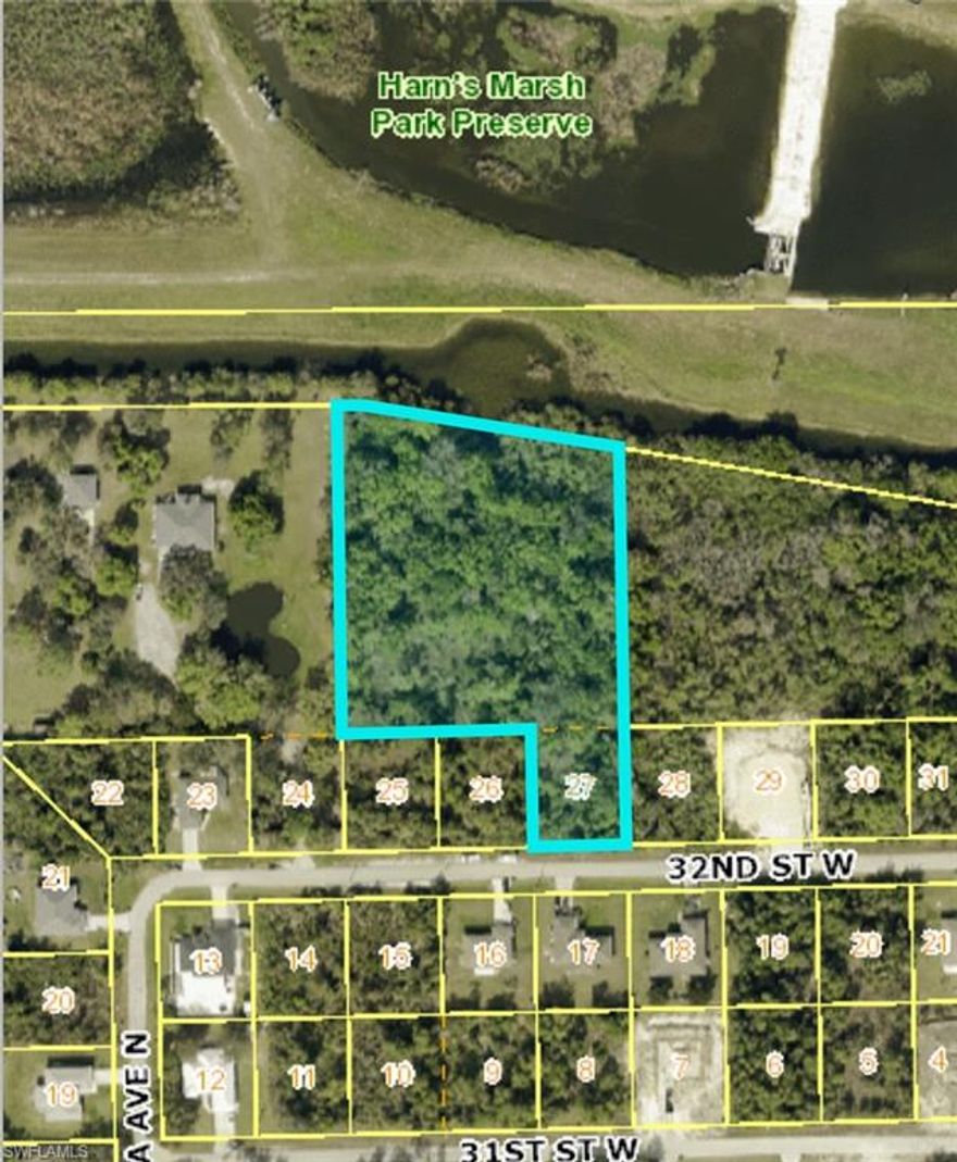 This unique opportunity to acquire this 2.53-acre piece of land in an exclusive, centrally located area of Lehigh Acres. The land is cleared for your next project. It backs up to Hans Marsh Preserve, offering serenity and privacy, close to schools, and steps from Sunshine Blvd, easy access to Fort Myers. Don't miss this opportunity to purchase this gem of a piece of land.