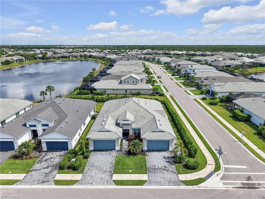 This highly upgraded 2BR + den villa in Azure at Hacienda Lakes has been very lightly lived in and shows like a model home!  This beautifully maintained home features elegant wood flooring, a spacious open floor plan, and a chef’s kitchen designed for both everyday living and entertaining. The den provides flexible space for a home office, guest area, or hobby room and is large enough to be used as a bedroom if needed.  There are many upgrades throughout including designer window coverings, lighting and fans, quartz counters and more!   There's plenty of room for a pool or an extended lanai!   Enjoy a peaceful private view from the main living areas and outdoor space, creating the perfect setting to relax and unwind.  Azure at Hacienda Lakes is a popular resort style community that offers a huge pool with cabanas, state of the art fitness center, library, card room, tennis, pickleball and a large clubhouse with an active social calendar.  This is the perfect opportunity to start enjoying the Florida lifestyle you deserve!