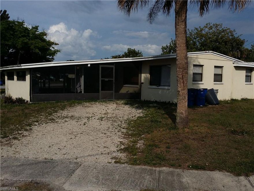 Location, location, location! Great opportunity for an Investor. There is a Tenant in place with Rent always on time and wants to stay! The Huge Lanai in the front of the entrance can be converted into a Carport. It also can be divided into two separate Rentals. The house has two kitchens and direct access to the County playground and Lake Moody in your back Yard! The schools are very close by, including Ft. Myers High School. It also has easy access to the main Highways, Downtown Fort Myers and US 41. Shopping, Public Pool, Wal-Mart, BJ's, Target and public Bus routes are close by. This great place to make your money work for you and it can be yours today.