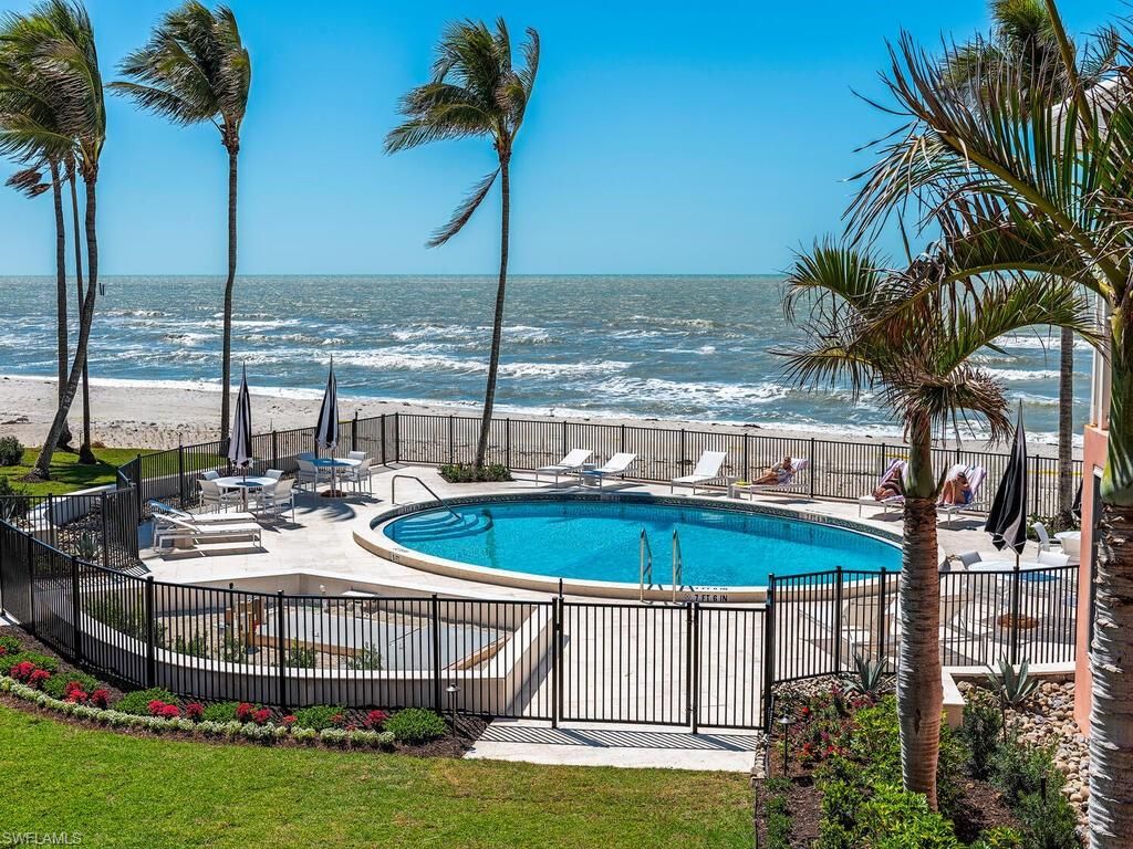 Photo of 2401 Gulf Shore BLVD N #VILLA 6, NAPLES, FL 34103 (MLS # 225076257)