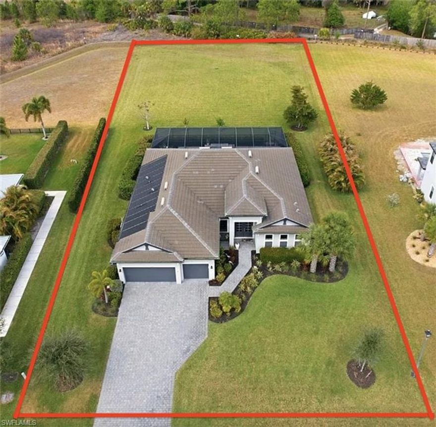 Rent this beautiful Resort-Home and you will be on vacation all year! Welcome home to this 4 years young highly upgraded ranch sitting on an entire stunning acre of land! Easy maintenance almost new home inside and out with a beautiful  salt water pool, screened lanai, solar and electric pool heater, Stunning landscaping and privacy.  Located in the beautiful Remington Oaks development in Buckingham this  HOA community is a wonderful place to live.  The house has a fantastic kitchen with 12 ft island and huge open concept living space.  Private master suite with door out to the pool, 2 walk in closets and a massive bathroom.  Beautiful landscaping and a HUGE yard for kids, dogs, or just the joy of not looking into another home behind you.  Unique opportunity for such a new home on a huge lot, move in ready and enjoy! Agents bring clients that are looking for a beautiful home, 3 beds, 3 baths, 3 car, Den/Office + Saltwater Pool on 1acre to enjoy living at a resort-home!