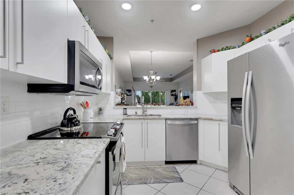 Photo of 7835 Regal Heron CIR #304, NAPLES, FL 34104 (MLS # 226028105)