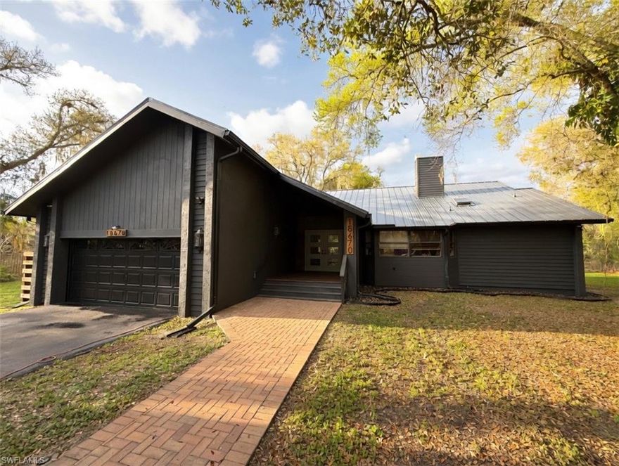 Rare, Private Creekfront Retreat on 1.5 Acres with Gulf Access.

Imagine waking up to peaceful creek views, towering oak trees, and the quiet beauty of nature—yet still being minutes from everything Southwest Florida has to offer. This beautifully remodeled 3-bedroom + den, 2-bath concrete block home sits on a private 1.5-acre wooded lot directly adjacent to 100 acres of protected county preserve, offering exceptional privacy, wildlife sightings, and tranquil surroundings.

One of the property’s most remarkable features is its approximately 340 feet of frontage along Telegraph Creek, a navigable deep tidal creek with Gulf access through the Caloosahatchee River. Launch a kayak, canoe, or small boat from your own backyard and explore Southwest Florida’s waterways while enjoying the peace of a private retreat.

The property is shaded by beautiful mature oak trees and features a charming gazebo—perfect for morning coffee, evening relaxation, or entertaining while overlooking the creek and natural surroundings.

Completely remodeled in 2021, the home includes:

• Seamless metal roof for long-term durability

• New central AC system for year-round comfort

• Whole-house Reverse Osmosis water system providing pure drinking water

• Updated plumbing and modern fixtures throughout

• Fully renovated bathrooms with contemporary finishes

• Beautifully remodeled kitchen with premium cabinetry, elegant quartz countertops, and stainless steel appliances

• Updated lighting and refreshed interior finishes

This expansive property provides space, privacy, and endless outdoor enjoyment.

Properties like this are very rare—offering acreage, creek frontage, Gulf access, and neighboring preserved land. Relax in your own private waterfront oasis with no rear neighbors and the natural beauty of Southwest Florida 

Schedule your private showing today and experience this unique waterfront retreat.