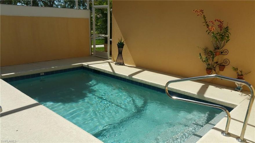 BEST PRICED 1836 square feet Cayman Model has poured concrete and also has your own PRIVATE POOL.  End unit with lots of privacy, freshly painted interior and new laminate wood flooring installed in April of 2017 in living areas make this very tastefully decorated unit move in ready.  Kitchen and baths both have ceramic tile flooring and stairs have brand new carpet.  DARE TO COMPARE - you will see what an excellent deal this is - priced to sell so don't hesitate!  Village Walk has affordable fees and every amenity you can imagine...onsite car wash, gas station, restaurant, beauty salon, post office and more.  Swim in your own private pool or head to the community pool to socialize with other residents, work out in the fitness center, get in a round of tennis, play some basketball or boccie ball - you will never be bored with all that is offered in Village Walk.  Agents:  Please see remarks.