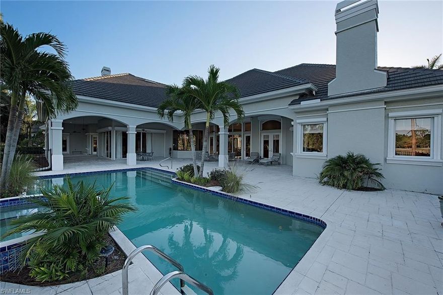 This rarely available custom estate home resides on one of the best panoramic lake/golf view homesites in all of Grey Oaks. The over 5,300 square foot expansive floorplan includes soaring ceilings and overlooks a wide lake view with 227 feet of lake frontage and the second and 10th greens of the famed Pine Course. The four-bedroom plus den and bonus room home includes a very livable open floorplan with updated wood flooring plus newer air conditioning units and roof. A large kitchen with updated countertops and appliances opens to a family room with a wood burning fireplace and two sets of sliders overlooking the magnificent views. The spacious master suite includes an additional fireplace, oversized walk-in closet, sitting area and adjacent bonus room. Additional features include a warm study with built-ins, large outdoor covered living space with pool and spa, electric hurricane shutters on most windows and a three-car garage with hurricane rated doors. The award-winning Grey Oaks Country Club has recently completed a multi-million dollar renovation.