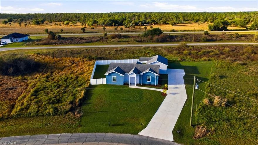 Welcome to your new home in Port LaBelle! This stunning single-family home boasts 4 bedrooms, 2 bathrooms, stainless steel appliances, and beautiful tile flooring throughout. Built in 2024, this home is practically brand new and located in a quiet area, perfect for those seeking peace and tranquility. The 22x28 detached garage/workshop with automatic doors provides ample space for parking and storage. The garage includes upgraded electric amps for welding as well as a RV/generator plug in. Situated on an oversized cul- de- sac lot, this home offers plenty of space for outdoor activities and entertaining. The upgraded features, including a fully monitored security system, ensure that you and your loved ones are safe and secure at all times. A new Washer and dryer and TV are all included in the sale. Step outside to the spacious backyard and enjoy evenings around the fire pit, making memories that will last a lifetime. Don't miss out on the opportunity to make this beautiful home yours - schedule a showing today and experience the luxury and comfort that this property has to offer. Live the life you've always dreamed of in this perfect oasis in Port LaBelle.