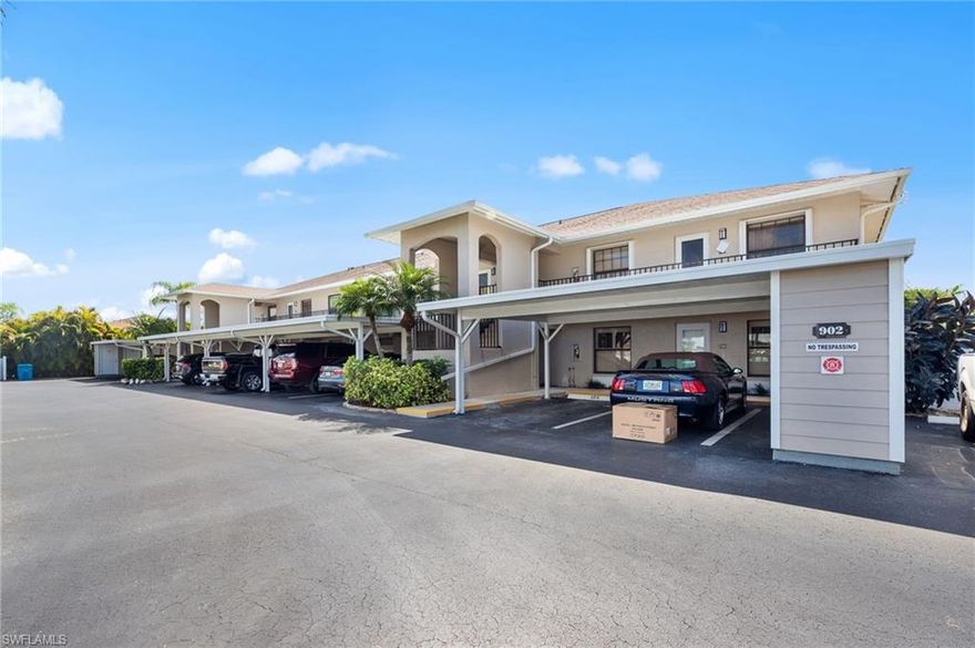 This first floor condo has a stunning view.  Walk inside and look straight down the intersecting canal.  The master suite is quite large with amazing canal views.  The huge living room gives you lots of space to hang out or entertain and opens into the kitchen with granite countertops and stainless appliances.  The AC system was replaced in 2025, and the building has a new roofer.  The HOA has great reserves and has updated everything include the pool area, resurfaced the parking lot, new carports, and recently painted the buildings.  This is a very well ran HOA with solid financials.