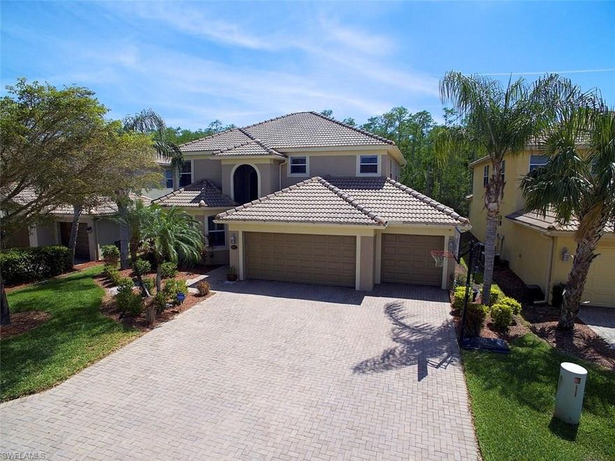 Custom Pool home featuring 5 bed, 3 baths, 3 car garage and almost 3,000 sq.ft. of indoor living area. Original Owners that have kept this home in exquisite condition! This home is loaded with upgrades including tile floors throughout the main living areas, Luxury Vinyl Wood flooring on the entire second floor, Island kitchen with wood cabinetry, Quartz countertops, custom backsplash, upgraded appliances, whole house water softener system (R/O water filtration in the kitchen) New 80 Gal. hot water heater...new Washer and Dryer, extensive crown molding, Plantation Shutters throughout, Recently painted Interior and Exterior. Where this home really sets itself apart is the custom saltwater pool and spa that you'd be proud to call your own....complimented by an oversized/artistic pavered pool deck, wide view screening and tropically landscaped with lush preserve views. Other features include a Pool Automation system (w/ wireless remote) and colored LED pool lighting. This home has 1 bedroom and 1 full bath on the main floor, with the Master as well as 3 bed/2 baths and laundry upstairs. One of Estero's hottest selling communities with Low HOA fees and an abundance of amenities!!