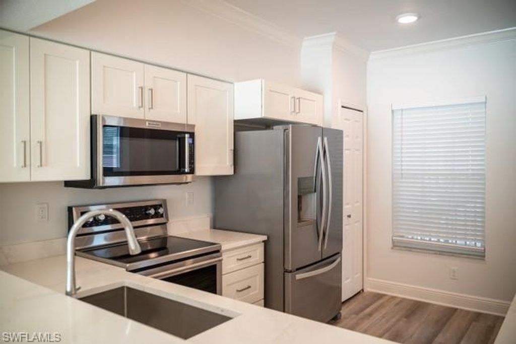 Photo of 3235 Cypress Glen WAY #309, NAPLES, FL 34109 (MLS # 226010430)