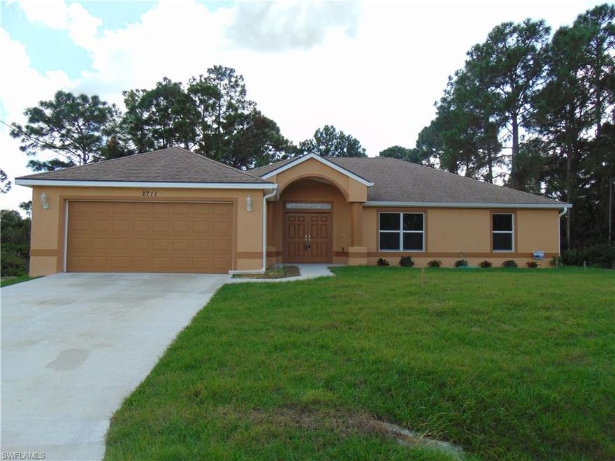 Welcome home! From the moment you walk through the double-door entry, you will fall in LOVE with this absolutely gorgeous 3 bedroom, 2 bathroom single family home. The house claims sophistication and elegance with all the bells and whistles you'd want in a modern, new home, including: immaculate tile flooring, solid wood cabinetry, granite countertops, plenty of windows, stylish lighting schemes and more... The split floorplan offers a spacious master bedroom, which boasts a tray ceiling and an adjoining, private ensuite master bathroom - complete with brand new finishes and dual walk-in-closets. A large family room gives way to a luxurious kitchen space with state of the art stainless steel appliances. In addition to this, the 2 car garage with auto garage door opener the expansive screened lanai with views of the wooded garden area make this home a true must see! More photos soon to be uploaded - the house is now complete with a brand new certificate of occupancy issued on the property. All that's missing is a new owner!  Call your realtor, to schedule your showing appointment today.