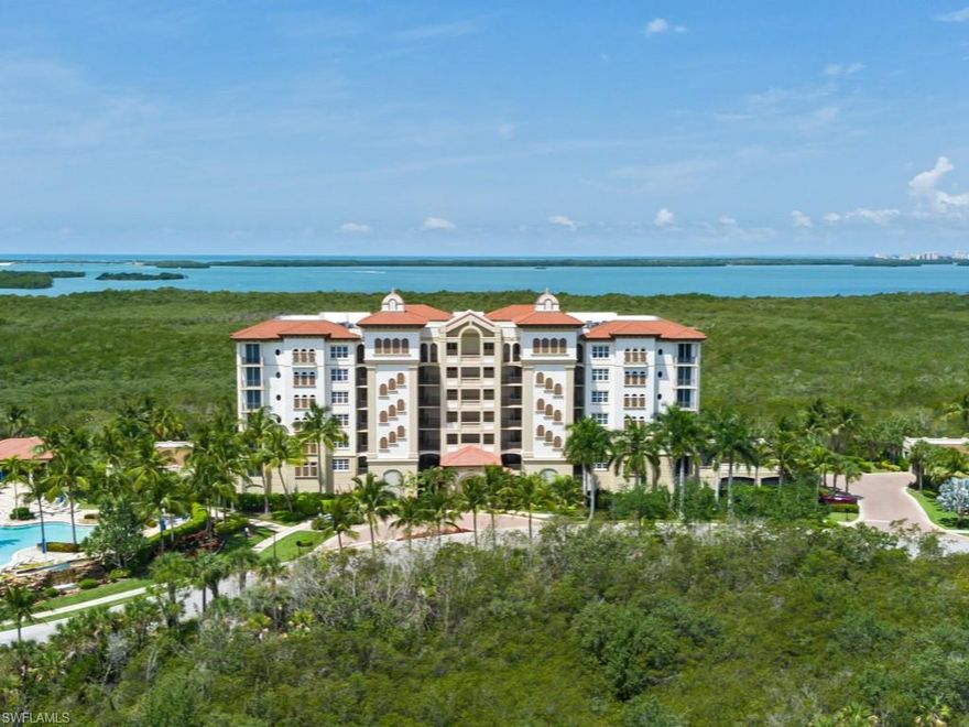 C5754- This 3rd floor residence in Castella at The Colony Golf & Bay Club has bay and sunset views, with some of the largest screened lanais in the community complete with hurricane shutters.  Gorgeous wood flooring with 3 spacious bedrooms, 2 1/2 bathrooms and abundant closet space, custom crown molding, kitchen with an island, granite countertops, and breakfast bar.  Enter double doors to the primary bedroom with a custom walk-in closet, massive bathroom with a soaking tub, oversized shower and his and her vanity. This residence comes with 2 covered parking spaces and a large storage unit, one of the nicest resort-style pools in The Colony and spa, with graduated entry, a screened social pavilion, gas grills, and firepit, just a short walk to The Bay Club!   Residents enjoy a 34-acre beach park, tennis, pickleball, canoe and kayak park, and fitness center.  Two golf clubs are available for optional membership. Close to dining and entertainment, and a short 30-minute drive to SWFL International Airport