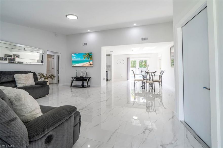 Fully Renovated Pool Home in The Woodlands | 3 Bed + 2 Bath + Efficiency | Newer Roof | Income Opportunity

Welcome to Taylor Drive in the desirable Woodlands community — a quiet, deed-restricted neighborhood with low annual HOA fees of just $240. Residents enjoy Gulf access via the private community boat ramp, as well as a park, tennis and pickleball courts, playground, grilling area, and scenic Lake Grasmere with T-Dock access — all just minutes from Fort Myers Beach, dining, shopping, and everyday conveniences.
Enjoy Gulf access without the waterfront price tag!
This home offers convenient Gulf access through the community boat ramp—perfect for boating and kayaking enthusiasts.

This move-in-ready 3-bedroom, 2-bathroom pool home has been fully renovated with modern finishes throughout. You’ll find elegant marble flooring, a 2023 roof, and a fenced backyard offering privacy and comfort. The kitchen features stainless steel appliances, white shaker soft-close cabinetry, and quartz countertops. A paved pool patio provides the perfect space for entertaining, while one bathroom offers direct pool access. Relax in the shade of the partially covered lanai overlooking the sparkling pool.

The converted garage functions as a 1-bedroom, 1-bathroom efficiency. It can easily be converted back to a full 2-car garage if desired.

Whether you’re looking for a primary home, seasonal retreat, or income-producing investment, this property delivers flexibility, value, and lifestyle — all within one of Fort Myers’ most sought-after Gulf-access communities.

Community Details:
The Island Park Woodlands Homeowners Association consists of 176 homes (with 4 vacant lots) and offers direct Gulf access via Ten-Mile Canal to Mullock Creek and Estero Bay, leading out to the Gulf of Mexico. Current amenities include a private boat ramp, tennis/pickleball court, playground, grilling area, Lake Grasmere, and T-Dock access — all maintained with low annual dues of just $240.

Learn more: https://ipwhoa.org/