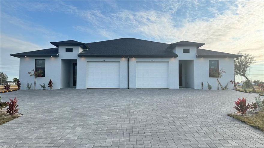 BRAND NEW & MOVE-IN READY! Be the very first to live in this stunning, newly completed duplex—just issued its Certificate of Occupancy this month. Each unit offers 3 bedrooms, 2 full bathrooms, a 1-car garage, plus two additional outdoor parking spaces, making it as practical as it is beautiful.

Step inside and fall in love with the modern open-concept design, featuring tile flooring throughout, soaring 10-foot ceilings, and custom 8-foot interior doors that flood the home with natural light and create an airy, upscale feel. Every detail has been thoughtfully designed with custom-made finishes for a sleek, contemporary look.

The spacious kitchen is both stylish and functional, complete with brand-new stainless steel appliances, ample cabinetry, and a pantry for extra storage—perfect for everyday living and entertaining. Both bathrooms showcase elegant glass shower enclosures, adding a refined, modern touch.

Built with peace of mind, this home includes hurricane-impact windows throughout, combining safety, durability, and energy efficiency.

Come see this beauty for yourself—you’re going to fall in love!