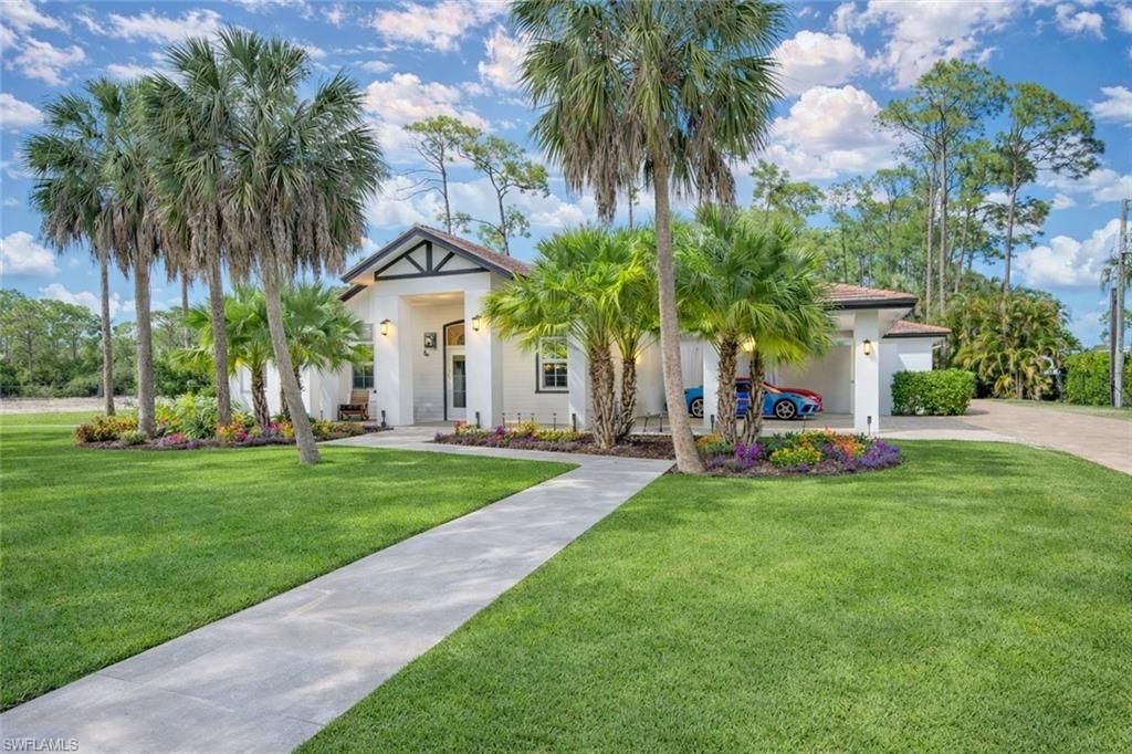 Photo of 2401 Coach House LN, NAPLES, FL 34105 (MLS # 226015844)