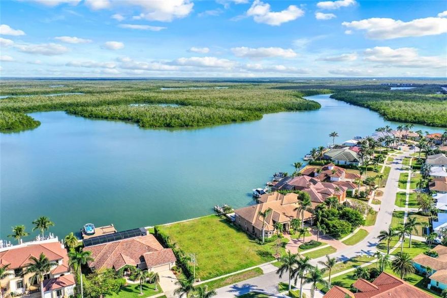 Expansive unobstructed views of Marco River from large direct access homesite of 100'X150' on beautiful Stillwater Court on Marco Island!  Awesome sunrise views from the homesite!