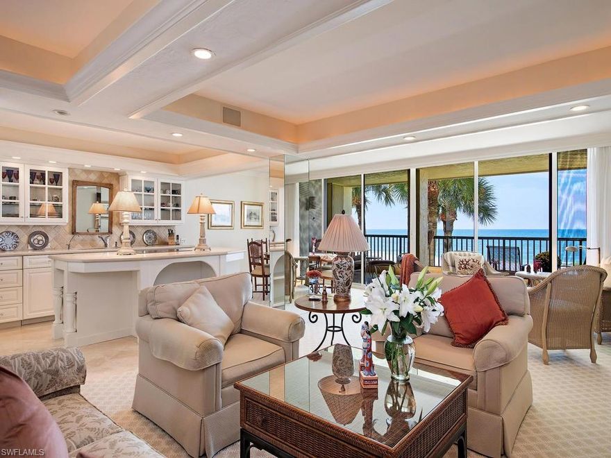 C.15465 - Just imagine connecting with nature as you watch dolphin and pelicans play outside as you relax in this beautifully decorated second floor, three bedroom, three bath condominium with direct west views of the Gulf.  How fantastic to be able to enjoy the sunset from this peaceful and private residence, featuring an open floor plan, tasteful furnishings, new carpet in living and bedrooms, freshly painted throughout, new AC and underground parking.  The recently revamped, guard-gated 10 acre resort community is unsurpassed in Naples, affording beach and boat lovers 10 acres of tropical paths, boat and kayak dockage adjacent to Doctors Pass, along with state of the art clubhouse, pools, tennis courts and fitness center.  This is a rare opportunity to experience your dream Florida lifestyle.  A unique and peaceful place to call home!