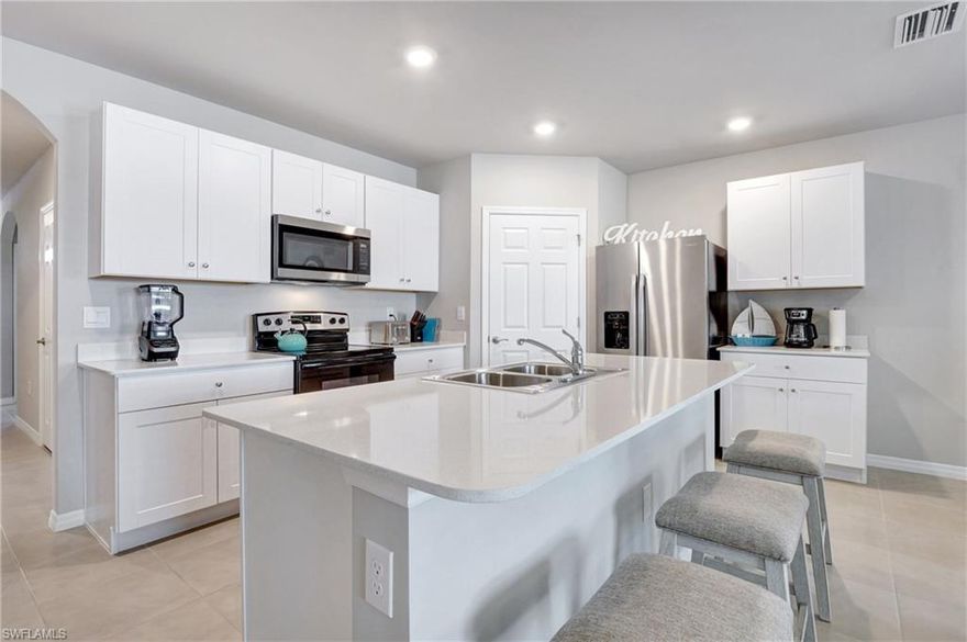 Act now to secure this 4 Bedroom Single Family Home incredible opportunity! This exceptional, spacious home boasting an abundance of storage and meticulous maintenance, ready for immediate occupancy. Built in 2023, it's like brand new. Conveniently situated near I-75, offering quick access to both Naples and Fort Myers. The expansive master suite features a generously sized walk-in closet. Enjoy the convenience of single-story living with an open-concept kitchen and a large island overlooking the expansive living room.No HOA restrictions mean you have the freedom to personalize your property as you wish, whether planting your favorite greenery or adding a fence, all without additional fees. This stunning home is competitively priced for a fast sale and will not stay on the market for long.