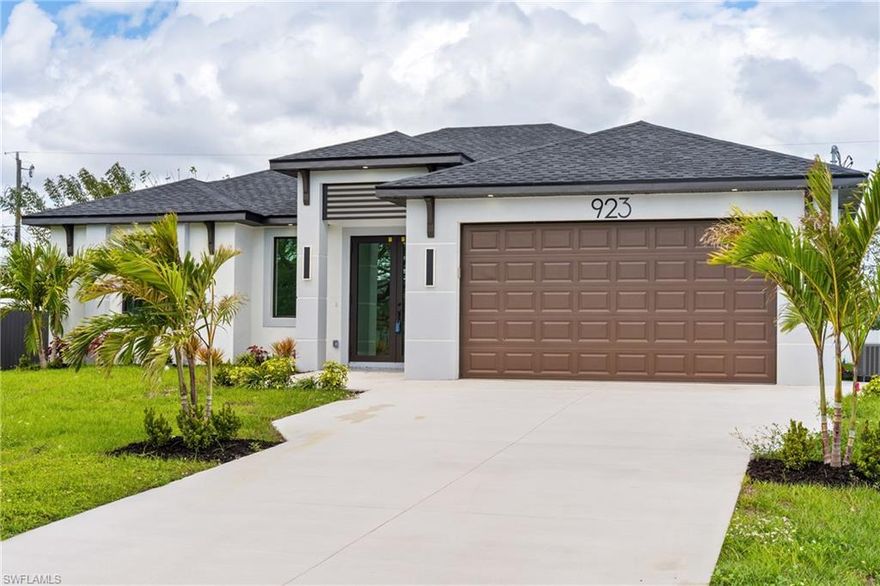 STUNNING CUSTOM NEW CONSTRUCTION HOME located in a highly desirable area of Cape Coral with NO HOA and low assessments! This beautiful brand-new home offers the perfect blend of luxury and indoor/outdoor Florida living.
Featuring 3 bedrooms and 3 bathrooms, this home showcases quartz countertops, dual sinks, spacious his and hers walk-in closets, and a beautifully tiled shower with multiple shower heads.
The open-concept living area is perfect for entertaining and flows seamlessly to the outdoor space, where you’ll find an incredible summer kitchen and a spacious backyard with plenty of room for a future pool. The third bathroom has direct access to the terrace, making it ideal as a convenient pool bath.
Built with hurricane-impact windows and doors for peace of mind, this home also includes many modern upgrades throughout.
Conveniently located near shopping, dining, and schools. Don’t miss this opportunity—schedule your private showing today!