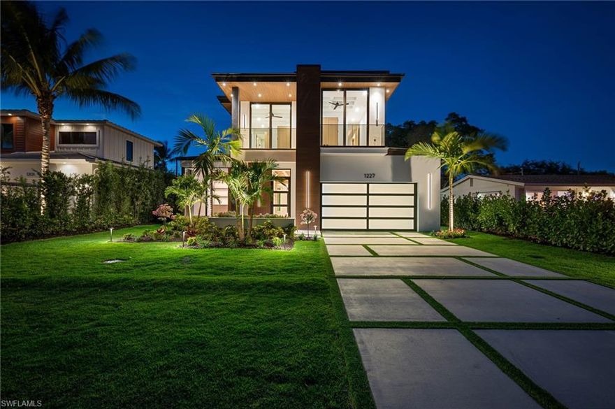 After much anticipation, this brand new residence is now complete and ready for immediate move in, offering an exceptional opportunity to become its very first owner. This custom built home showcases refined luxury, thoughtful design, and exceptional craftsmanship at every turn.

Designed for elevated living and effortless entertaining, the home features Wolf and Sub Zero appliances, including two 30 inch designer column refrigerators, wide plank white oak flooring, and custom cabinetry with solid white oak doors handcrafted in Chicago. Kohler Vibrant Titanium fixtures elevate each space with a sleek, modern finish.

Bifold impact sliders open seamlessly to a resort style outdoor living area, complete with a saltwater pool and spa, exterior fireplace, and a fully equipped outdoor kitchen. A 500 gallon propane tank services the gas cooktop, water heater, and pool and spa heating system, ensuring efficient and reliable performance throughout the home. Interior and exterior tempered glass railing systems add architectural drama while maintaining a clean, modern aesthetic.

Ideally positioned in the heart of Lake Park, one of Naples’ most desirable neighborhoods, the home is just moments from the canopy tree lined beauty of 13th Street North, Baker Park, and the scenic bridge over the Gordon River leading into the Gordon River Greenway. Enjoy close proximity to the Naples Zoo, Gulfshore Playhouse, 5th Avenue South, 3rd Street South, and Naples Beach.

Move in ready. Live at the center of it all. Live Lake Park.