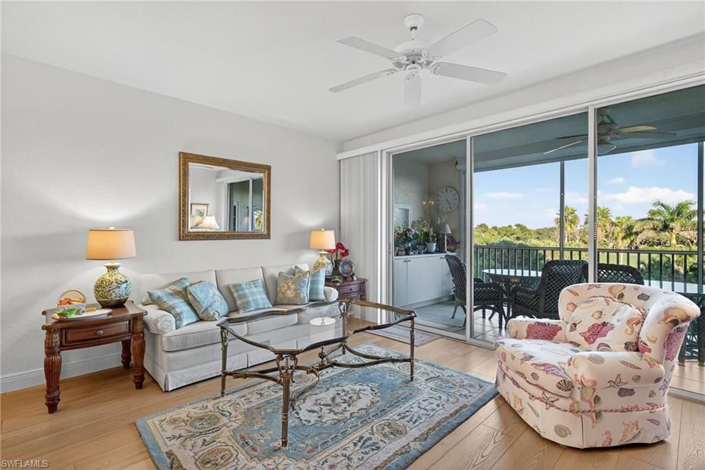 Photo of 7687 Pebble Creek CIR #303, NAPLES, FL 34108 (MLS # 225081545)