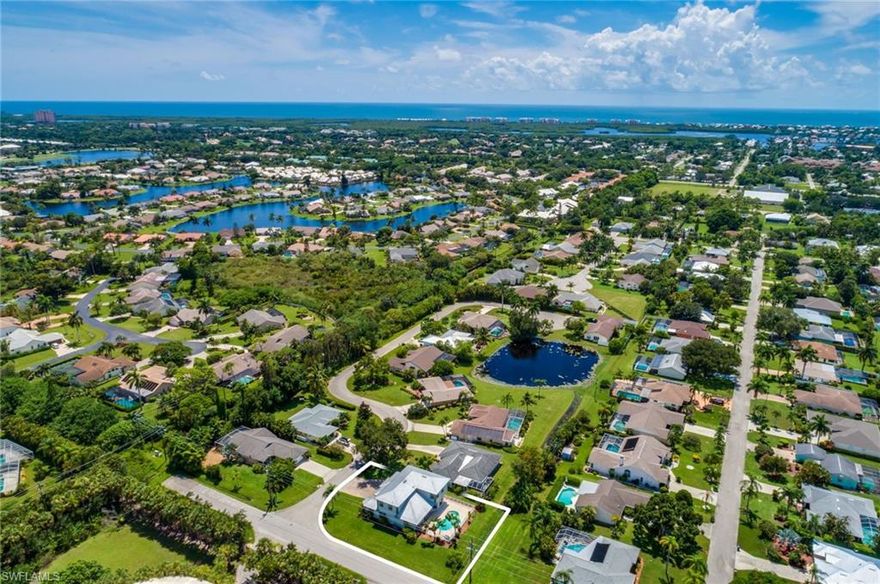 Prime Location!!! Welcome to Lake Pointe, one of Bonita Beach most desired communities of only 10 homes and very low HOA fees. One-of-a-kind location just off Bonita Beach Road & West of US41. Only a short bike ride to the white sands of BONITA BEACH, Publix & shopping.  This wonderful Corner lot  Single Family Pool Home is very  well maintain, situated in a Cul-De-Sac  private street, features nearly  3,000 Sq. Ft of living space, 4 large  Bedrooms, 1 office, 1 Den,  3 Full  Bathrooms, 1 Half guest bath,  and a  4 car garage/workshop, plenty of space for your jet-sky, paddle boards and more. Open Floor Concept, vaulted ceilings, freshly painted,  formal dining room, oversized  family room, newer appliances, brand new light fixtures, hurricane impact windows and doors, built-in entertainment center, central vac, newer AC unit, custom lighting. Excellent natural light. Spacious Master Bedroom with vaulted ceilings. Master Bath with granite, large walk-in-shower with two shower heads and 2 large walk-in closets,  laminated wood flooring in all living areas, newer carpet in bedrooms . Step out through the sliders from the great room to the pool, fenced yard,beautiful landscaping.