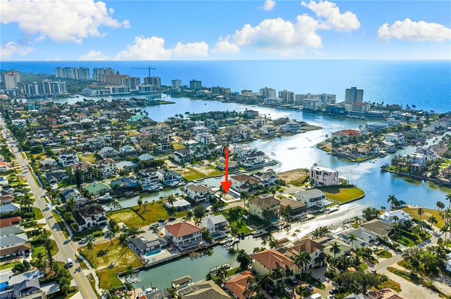 Welcome to 418 Seagull Ave — a cleared, build-ready waterfront homesite in the heart of Naples’ highly coveted Vanderbilt Beach/Conners community. This quiet short cul-de-sac street is lined with impressive new construction, offering a peaceful setting surrounded by luxury homes all directly on the water as well.

The lot is approximately 75' wide with highly desirable southern rear exposure, providing warm natural light across your future pool, outdoor living area, and waterfront views from sunrise to sunset. A newer dock already sits behind the property, allowing immediate enjoyment of the water or easy integration into your new design. Water and sewer connections are already in place, and you will benefit from lower impact fee's for rebuilding on a site where a previous home existed, helping streamline the construction process and save you money on the build.

Here, it is fully feasible to design and build well over 6,000 square feet of luxury living space if you would like with height allowances of up to 35 feet, making a rooftop deck or elevated outdoor living level an incredible option for long views and magical Naples sunsets amongst the treetops. With NO HOA, the neighborhood allows many architectural styles, so build your dream house on this well-suited to the lot. We have luxury builders and architects standing by—or bring your own builder and architect to bring your ideal waterfront home to life.

Location is the true highlight. You're minutes from The Ritz-Carlton Beach Resort, La Playa Beach & Golf Resort, and the iconic Turtle Club Restaurant, making this one of Naples’ most walkable, beach-accessible boating communities. World-class shopping and dining await at Mercato, Waterside Shops, and 5th Avenue South—all a short drive away. Traveling is effortless with Southwest Florida International Airport (RSW) just 30 minutes north.

On a street filled with luxury homes—including a residence listed for over $12M.  418 Seagull Ave stands as one of the best opportunities in Conners. Waterfront lots under $2M with premium southern exposure on a quiet cul-de-sac simply do not come around often. 

Design your dream waterfront retreat and enjoy one of Naples’ most desirable central locations—where boating, beaches, dining, and luxury living all meet.